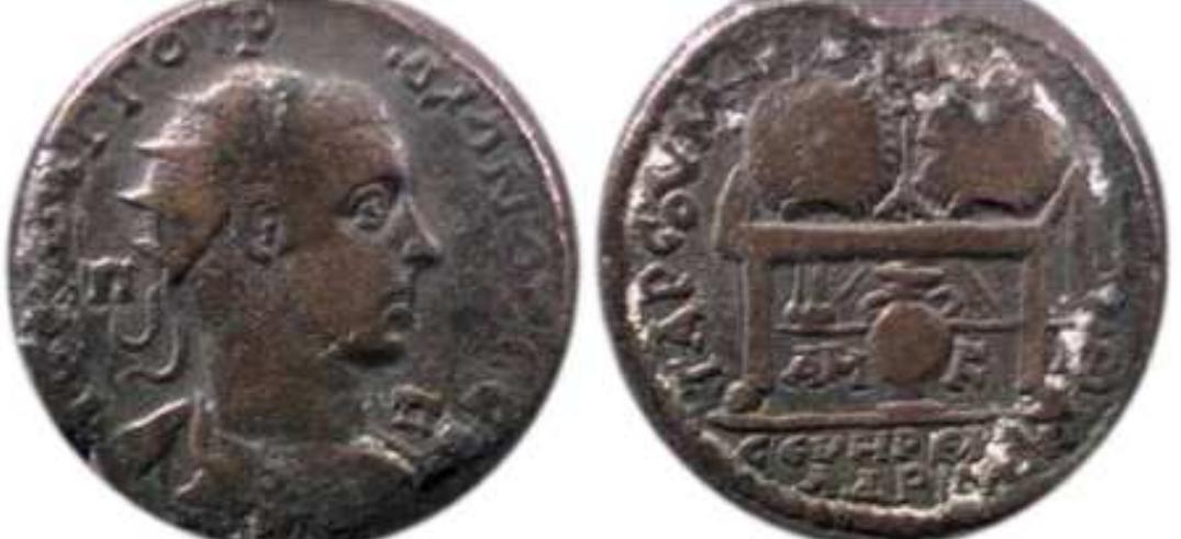 Gordian Ill AE35 of Tarsos, Cilicia. AVT K M ANT [OPAIANOC CEB I1-I, radiate, draped and cuirassed bust right / TAPCOV MHTPOIOAEQC AMK IB CEYHTIIEIA AAPIANA, two prize urns on table, amphora below. Ziegler 760; SNG Lev 1139; Woodward hoard 155. Wildwinds.com. 