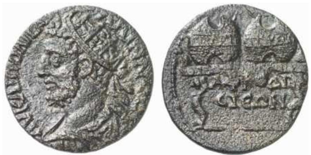 Gallienus, AE26 of Aphrodisias, Caria. AD 253-268. AY KAI TIO Al TAAAIHNOC, radiate, draped and cuirassed bust left. Two prize urns crowns inscribed TOPAIANHA and I1YOIA, each containing palm branch, on a table, its top inscribed OIKOYMENIKOC, APPOAI- CIEQN in two lines below. BMC 147; SNG Tuebingen 3361; MacDonald R540. Numismatik  Lanz auction 131, Lot 95, Nov. 2006. 