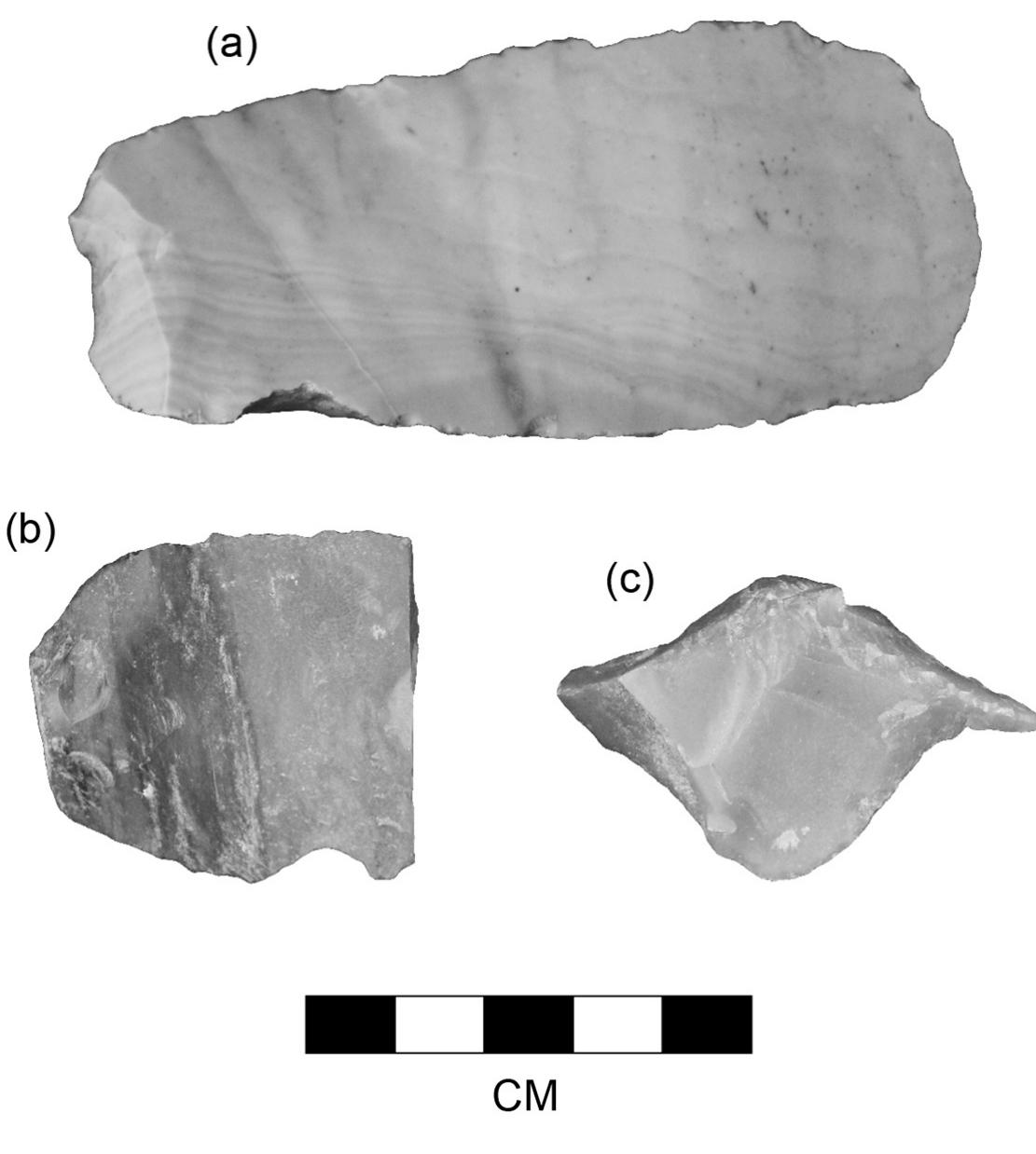 Figure 5. Two of the spokeshave tools and one of the graver tools in the Perry cache: (a) spokeshave, Item 8; (b) spokeshave/scraper, Item 46; (c) graver, Item 10. 