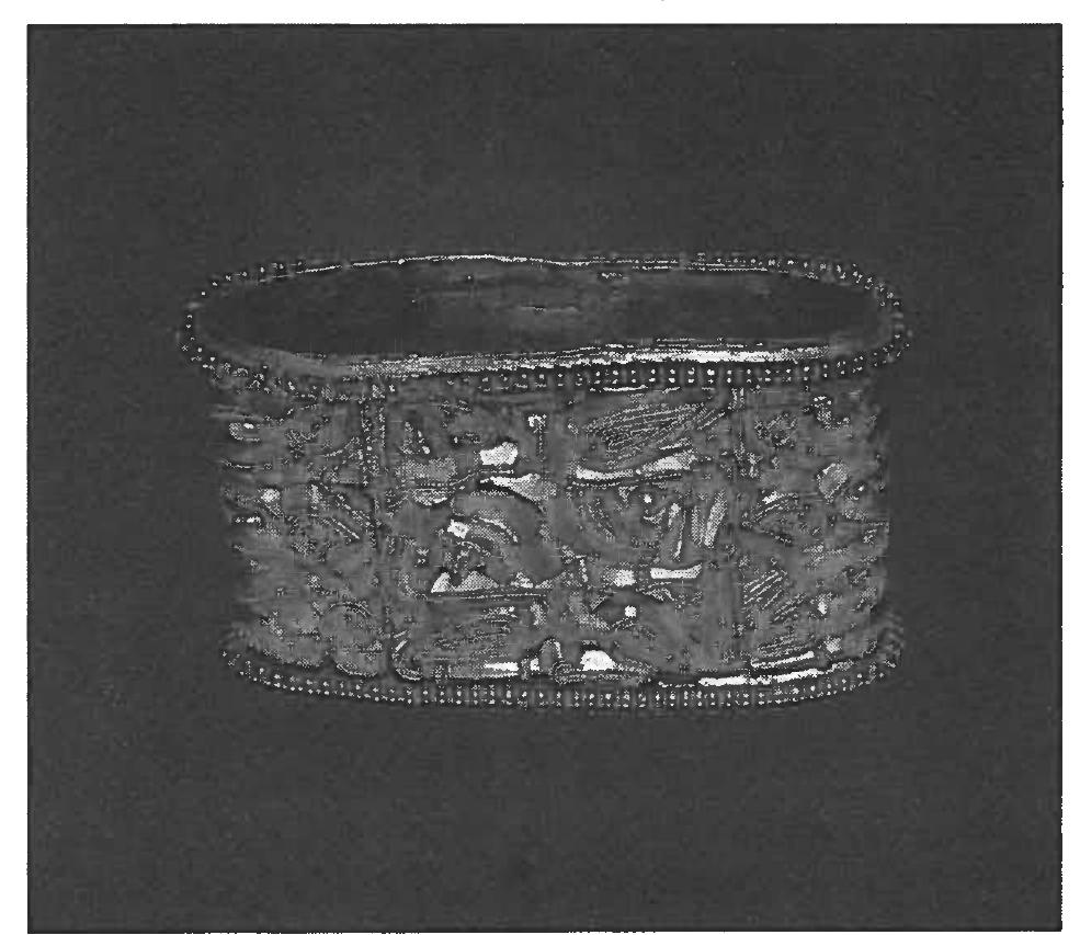 Fig. 3: massive gold sword-scabbard mount from Gudme on Fyn (Photo: National Museum, Copenhagen). 