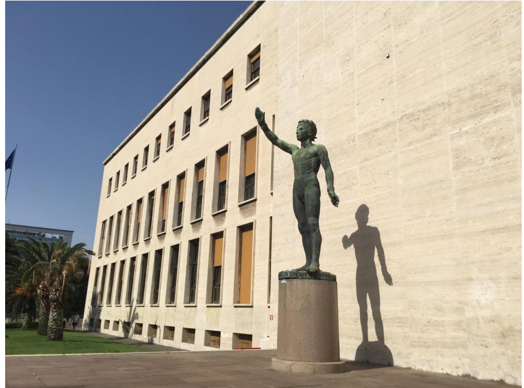 Fascist Office Rome Rome, palazzo uffici, lateral entrance with genius of