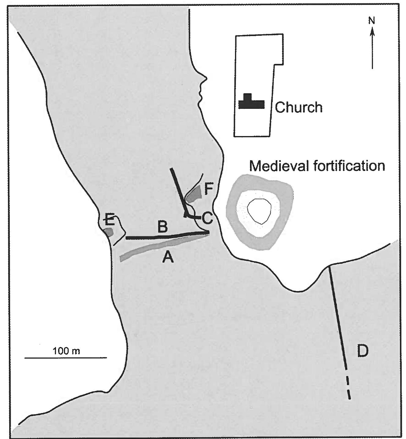 Harbour or wharf structures E and F by the eastern shore of the cove immediately W and NW of the castle hill. 
