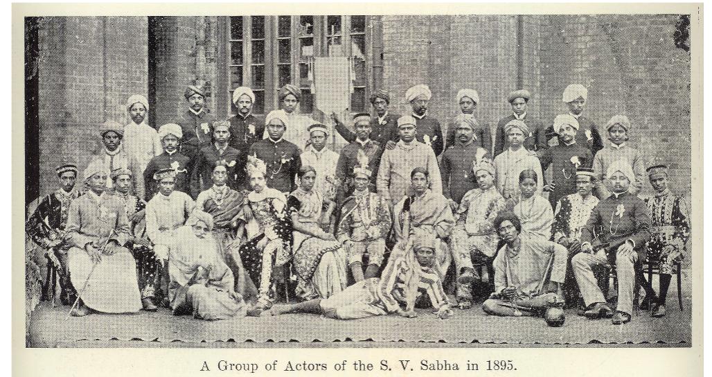 Figure 4. Actors of the Suguna Vilasa Sabha, 1895. Courtesy of Sriram V., private collection.  HNOVAUOT Ulat tlds CoCapeG NOUCEe UNH DOW.  Two icons of drama history expanded the company concept and greatly enlarged the reach of Tamil drama. Pammal Sambanda Mudaliar, a social reformer and lawyer, founded the Suguna Jilasa Sabha in 1891. A prolific playwright, he adapted Shakespeare into Tamil and favoured a iterary approach to dramaturgy. His long-lived company popularized musical drama among the irban elite. His activities in the Tamil diaspora deserve greater attention, in that he toured Ceylon, surma, Malaya, and Singapore.” (Figure 4.) Sankaradas Swamigal was the second key figure, ssociated with the spread of professional theatre troupes outside Madras, particularly in southern ‘amilnadu. He too toured abroad. His boys’ companies achieved fame and led to a proliferation of his model. Both pioneers incorporated Parsi theatre style and managerial practice while promul- ating Tamil culture to a mass audience.  