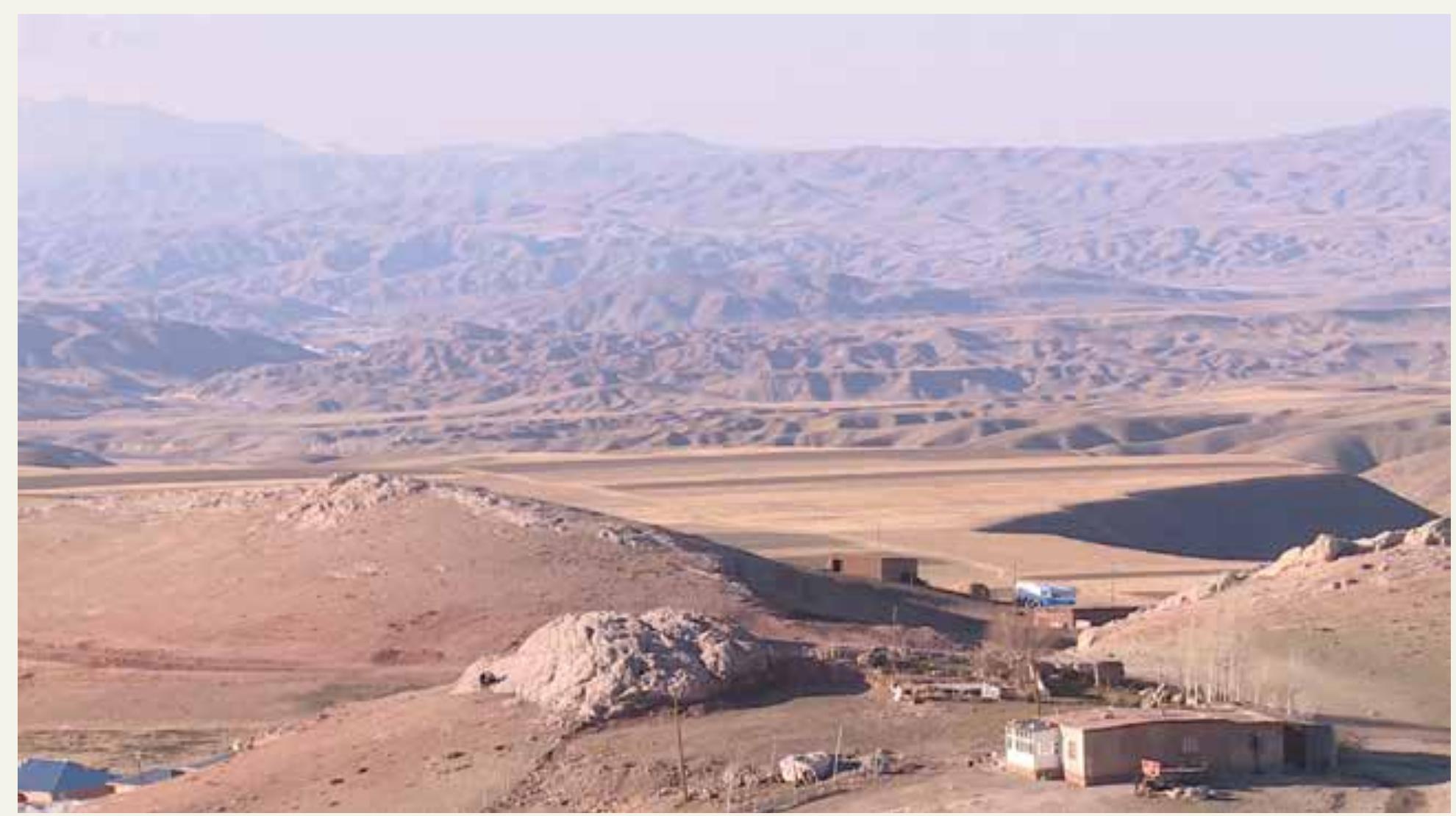 Figure 5: Photo from the Turkish borders with Iran. [Photo: Volkan Nakiboglu] Courtesy of Hale Goniiltas and Volkan Nakiboglu, the author is thankful for their generous sharing.  efugees face with mortal danger in this mountainous region. When border guards attack, refugees  tampede into the mountains to hide. Since they have no idea about the routes in the mountains,  hey some  imes hide behind rocks to spend the night ti  1 a smuggler finds them for another cross-  ng attempt. Unfortunately, most of the deaths occur during this clandestine waiting as they either  reeze to d  eath or get attacked by wild animals. In  his  [Turkish smuggler] exact depiction, “there  ire always bones on this route in the winter and summer. Those who do not know assume they  re anima  bones. All of them belong to humans ea  en  by wolves”. The lucky ones survived from  his horrendous terrain are taken to what the smuggler calls shock houses, the barn-like houses  efugees s  ay before and after crossing attempts. “T  hey are really in shock when they stay in these  laces” he [smuggler] comments while explaining why these houses are called as such. 