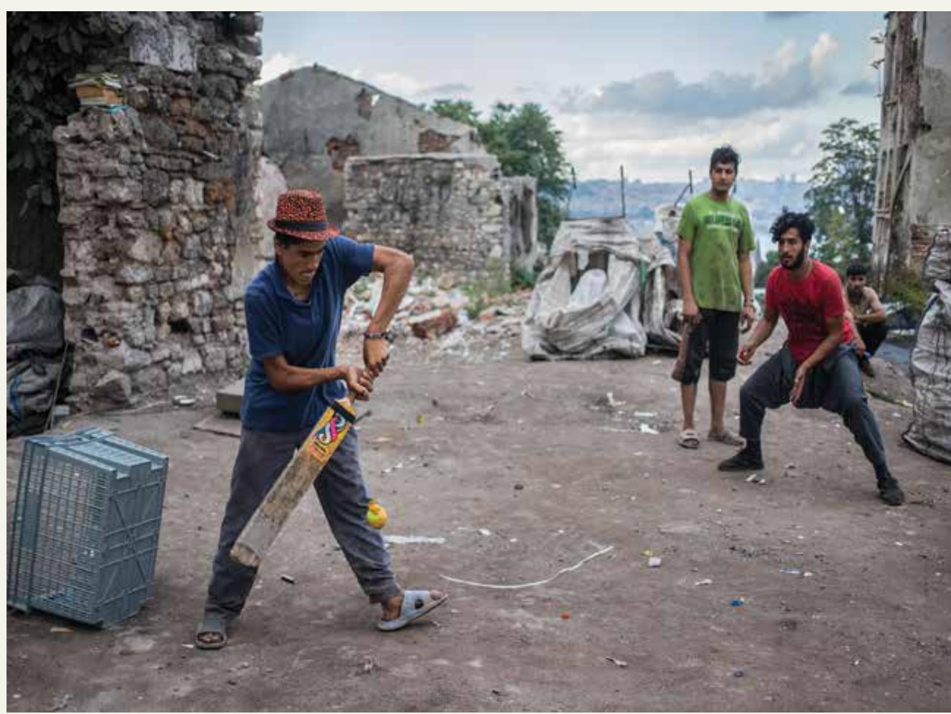 Figure 7: Afghans playing cricket. [Photo: Emirkan Cortit] Courtesy of Emirkan Corut, the author is thankful for his generous sharing. This photo was originally published in the 7th issue of beyond. istanbul, Mekanda Adalet ve Multecilik. 