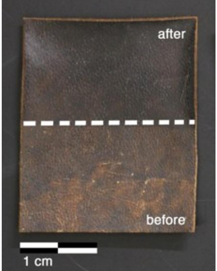 Figure 9 H2 sample (Roman Missal cover, 1725 AD) before (bottom) and after (top) treatment with the pHEMA/PVP H58 gel (loaded with EAPC) and a mixed calcium hydroxide — calcium lactate nanoparticles dispersion in 2-propanol. The area on the bottom shows the presence of surface dirt. The area on the top shows the removal of the white-grey surface patina of dirt enhancing the underlying leather surface 