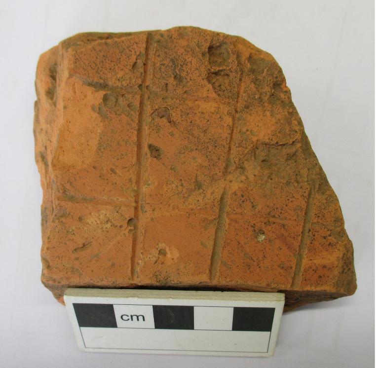 Fig 11 Pre-fired tile board with grid board design from Topsham, Devon. (Photo: Peter Warry) 