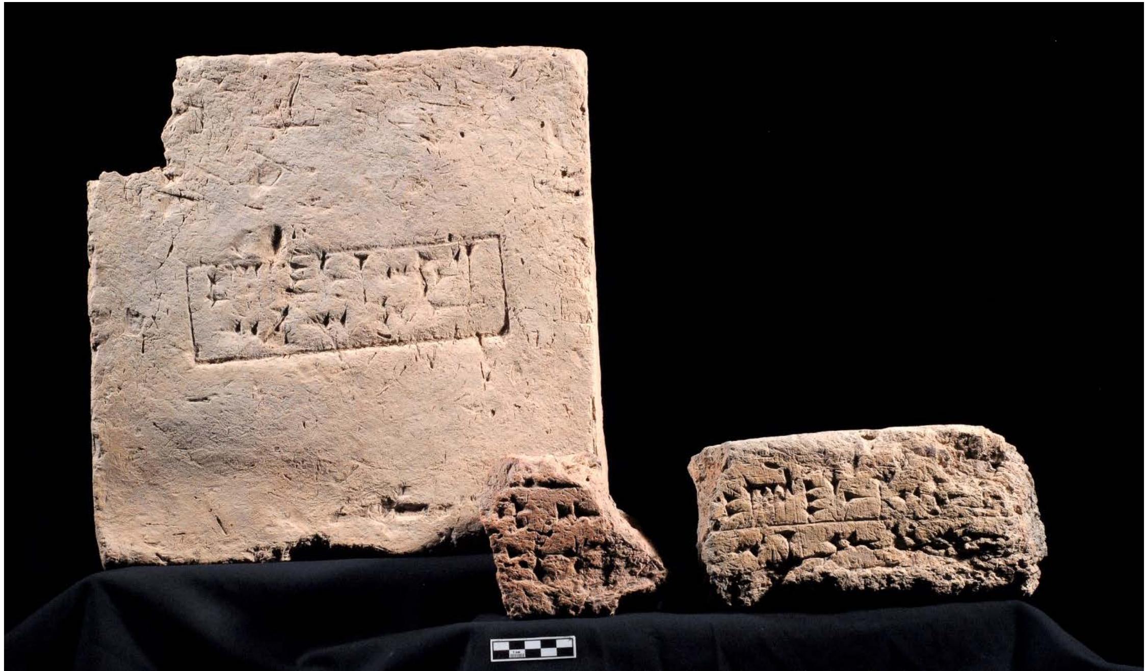 Fig. 9.4. Baked bricks from area C (except the one to the right, from the British Museum dig house) with the cuneiform inscription "Palace of Sargon, king of the world, king of Assyria", c. 710 BCE. 