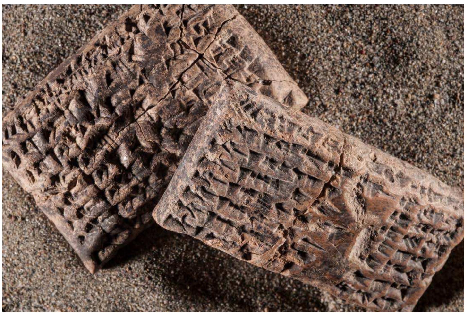 Fig. 9.5. Two clay cuneiform tablets each registering a loan by the Assyrian governor of Karkemish of 20 kgs of silver weighed according to the “mina of Karkemish”, 7 century BCE.  Fig. 9.5. Two clay cuneiform tablets each registering a loan by the Assyrian governor of Karkemish 