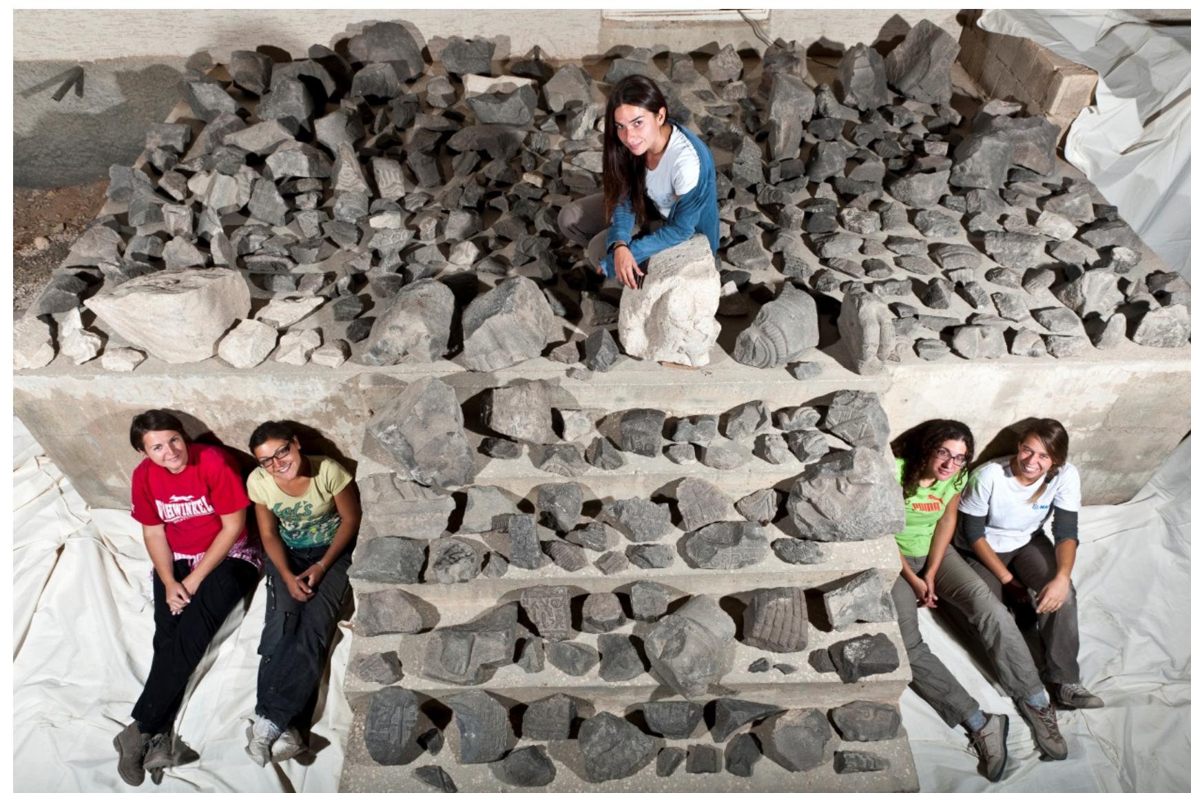 Fig. 13.5. Iron age basalt and limestone hieroglyphic inscriptions and sculptures found in 2013 in the ruins of the British Museum dig house. 