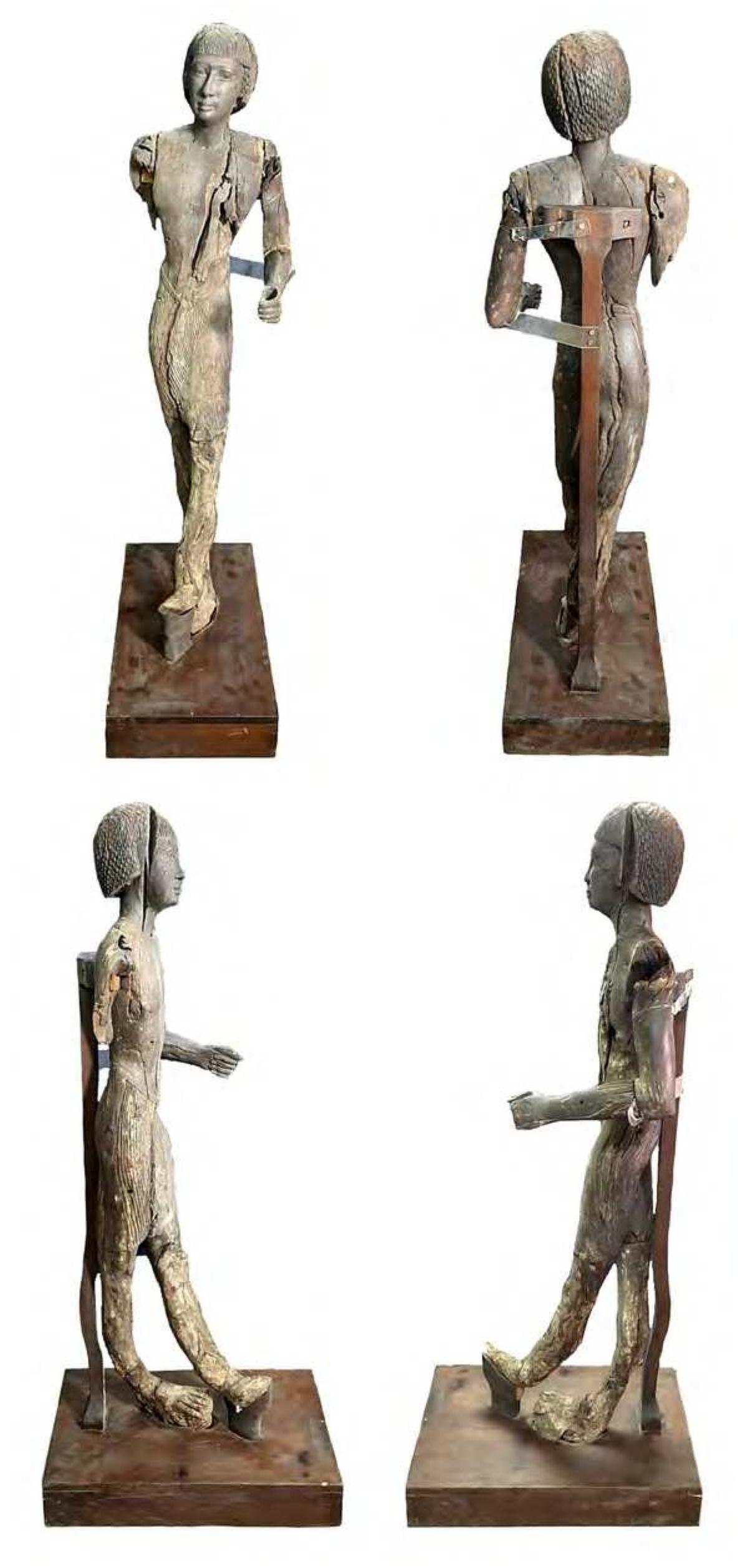 Fig.2 General views of the wooden statue JE 100373 after its conservation by Abd El Rahman Medhat and its re-positioning on a modern base (photos A. Medhat) 