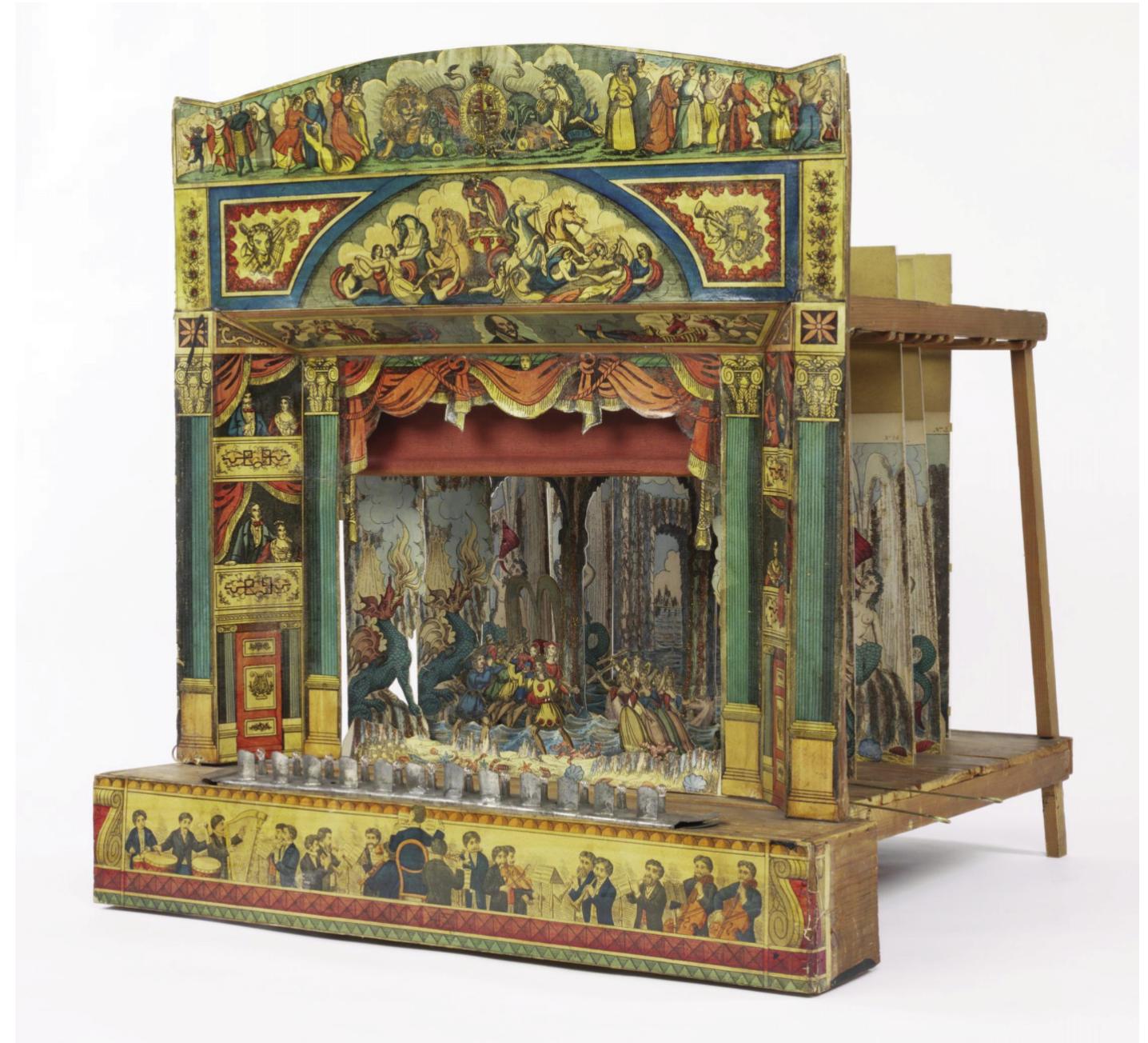 The first writers to comment on toy theatres tend to be nostalgic in their descriptions of miniature theatricals. These male authors reca  boy boy:  s. Edward Draper, writing in 1868, remembers how “nearly  a toy theatre, with its pasteboard characters and scenes” (181). J  wri  ling their own  hoods tend to emphasize the roles the theatres played in the lives of young  every boy had ohn Oxenford,  ting three years later, enthuses about how these theatres were once “the  most valued treasure that a boy in his early teens could possess” (67). While Oxenford notes that “young ladies of the family might assist wi  ort  heir camel’s hair pencil” he remarks that “in a well-regulated  th their scissors  household the  manager and proprietor was always a boy” (67). This comment seems to imply,  Figure 1. Toy theatre with characters and scenes for The Silver Palace, Benjamin Pollock, wood, card, tinsel and metal, 63.5 x 68.5 x 61.0 cms. © Victoria and Albert Museum, London. 
