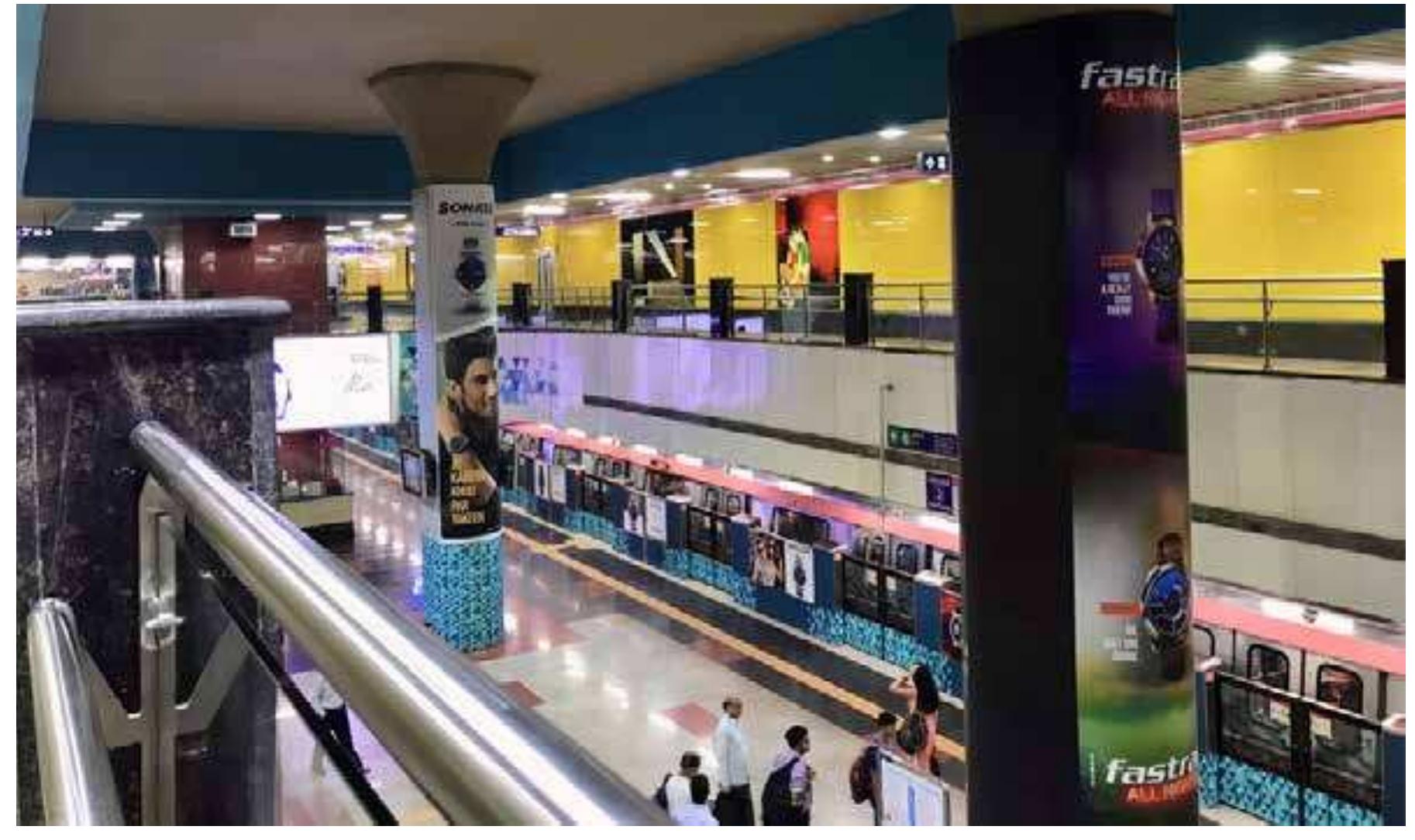 Sensing the inside versus outside, with all their disjunctive elements, tells you where you are, but also perhaps who you are. Who is invited into and who is excluded from the Metro sensorium? Delhi's is one of the cheapest metro systems in the world, transporting three million riders a day, yet it is also out of reach for the poor and for many working-class people, most of whom walk, bike or take the bus. What then are the politics of these inside—-outside sensations? This essay argues that the Delhi Metro does not simply smooth things out (it is not just a leveler), whether based on class, gender or other social grouping; rather, it also amplifies social belonging and exclusion.   An array of shiny, smooth surfaces, from handrails, floors, walls and the trains themselves come together to help create the Metro’s sensorium.  Pink Line. Dhoton: Rachmi Sadana 