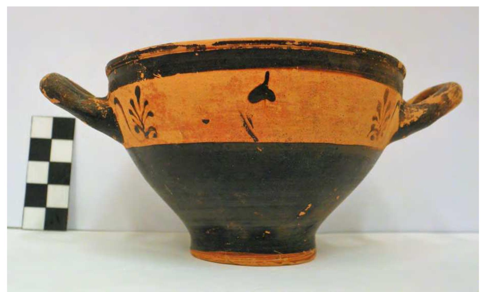 Fig. 54. Black-glazed stemless cup from Grave 7. Photo P. Galiatsatou. 