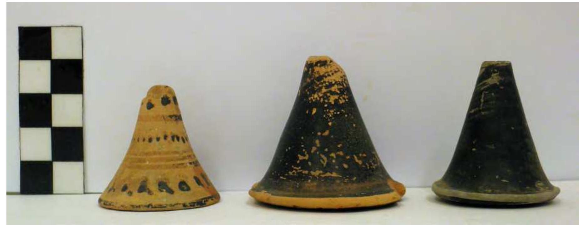 Fig. 80. Three spindle whorls from Pyre 3. Photo P. Galiatsatou. 