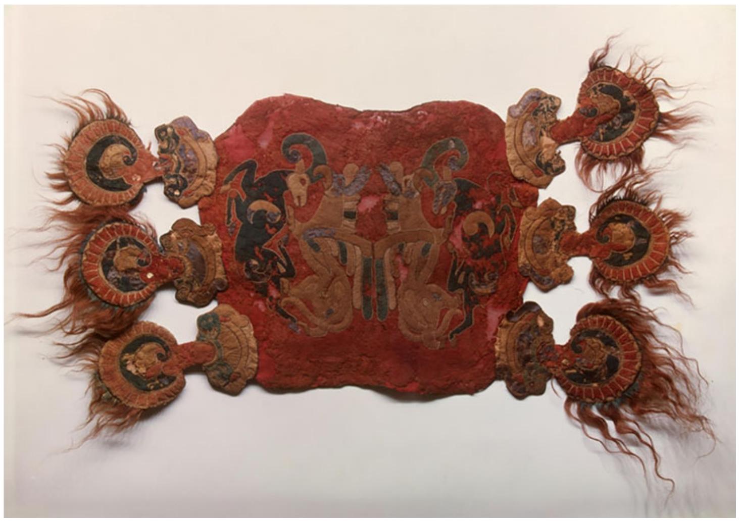 Fig. 1. Saddle cover. Felt in the applique technique. Pazyryk barrow no.I, 5 to 4 Century ce, South Siberia (excavated by M. P Gryaznov, 1929), Image is used from www.hermiatagemuseum.org, courtesy of the State Hermitage Museum, St Petersburg, Russia. 