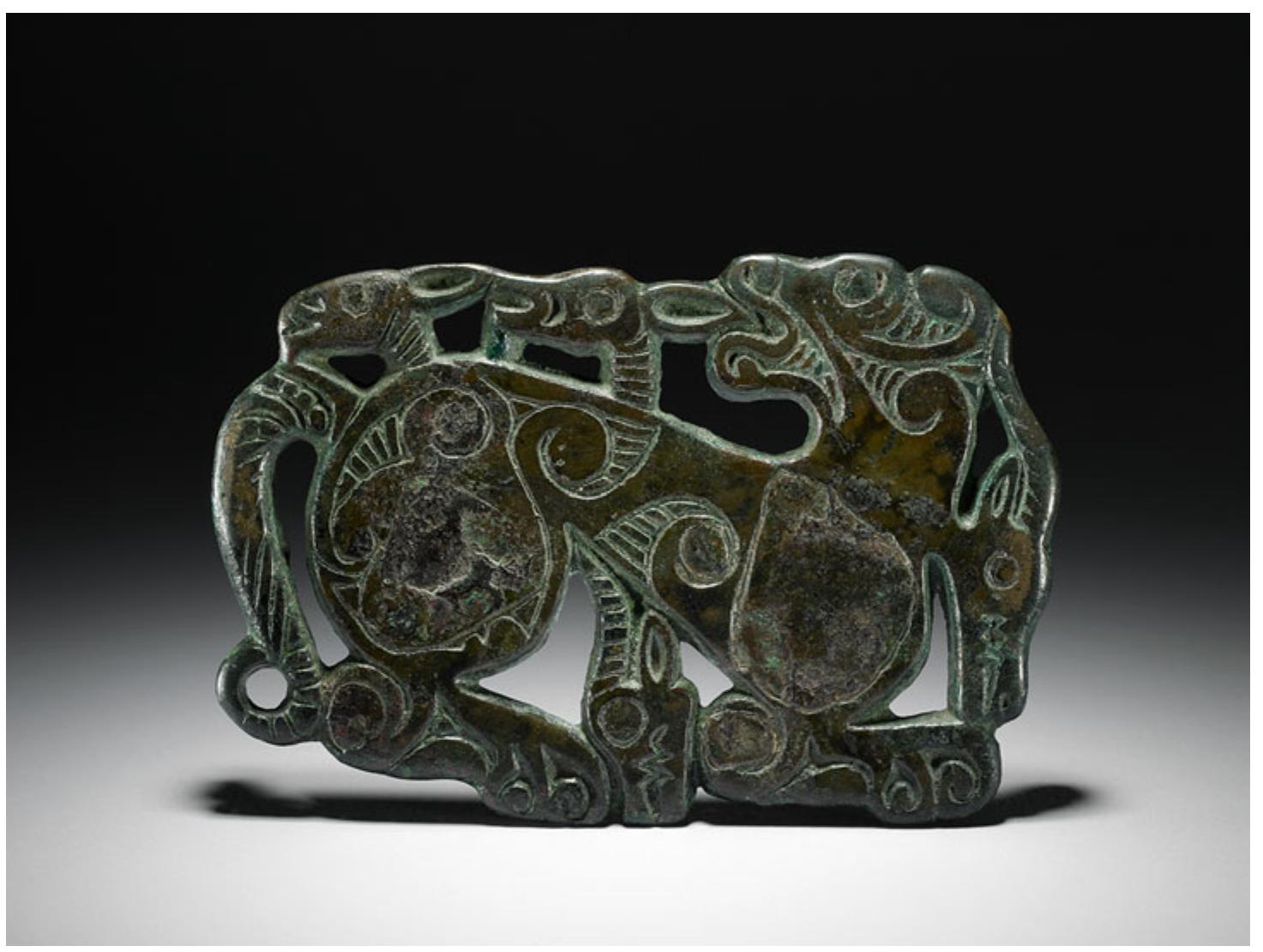Fig. 5. Plaque of a tiger attacking ibex. Bronze. Ordos, North China. 5" to 3™¢ Century sce Image courtesy of the Trustees of the British Museum. 