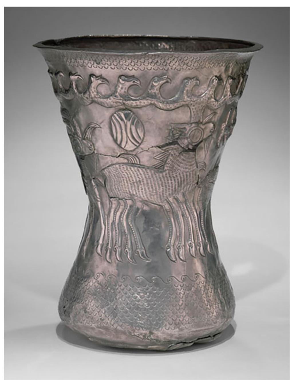 hoofed legs. (Fig. 7) This depiction was not one-of-a-kind: a closely related example, exca-  va  ted in Agighiol in modern-day Romania, is likely the work of the same workshop.'’ On  the bottom, a winged beast reminiscent of a griffin chews on an animal leg and grasps a small beast in its clawed feet, thus bringing us back to the repertoire of aggressive pre-  dai is Al  tion. The configuration, and particularly the presence of the bird-deer antler trope, indebted to animal-style visual rhetoric and its penchant for idioms of substitution. though the material culture of the Thracians invites associations with steppe peoples  from Central Asia, their visual culture was also closely associated with Classical Greek art. Interactions with Scythians further east might have contributed to the unique con-  ce  ptual entanglement present in the silver cu  p but Thracian workshops and craftsman-  ship were following the models of their sedentary neighbour Greece. In the product, we encounter a steppe visual idiom (zoomorphic juncture) framed in a Greco-Roman for-  mat. Finally, this method of local framing of im  ported visual repertoire occurs in the cities  of yet another sedentary empire: China. During the third and second century sce, as China starts to buy more heavily into the nomadic market by manufacturing steppe gold in its  own workshops for export to the north, we o  bserve several curious implementations of  gold jewellery of steppe design in tombs which are located very far from the abode of  the Xiongnu nomads who occupied the nort  hern periphery. For instance, the Xuzhou  elite cemetery complex in Jiangsu province and the royal tomb of King Zhao Mo in 