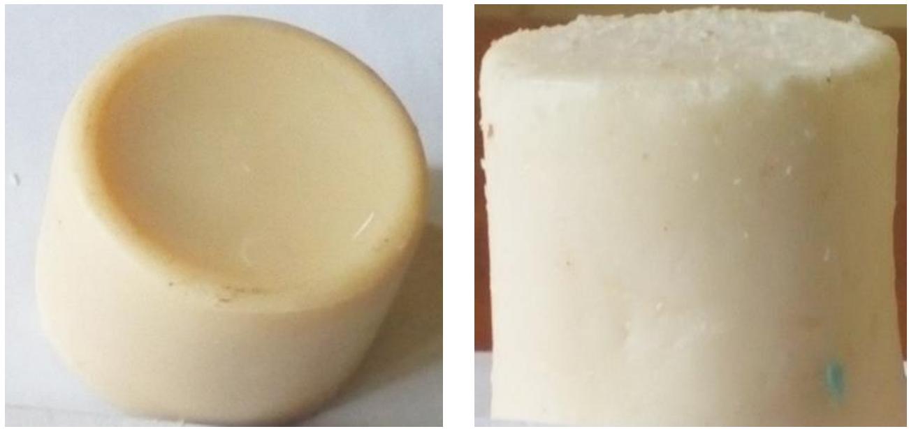 The soaps were produced using the cold process with slight modification. The appropriate amount of the oils were weighed and melted and mixed with 20% of NaOH in a beaker. After stirring for 30 mins, it was poured into a mould and allowed to cure. It was removed from the mould after solidifying.  Figure 1 (a) Bleached palm oil (BPO) soap (b) Moringa oil soap 