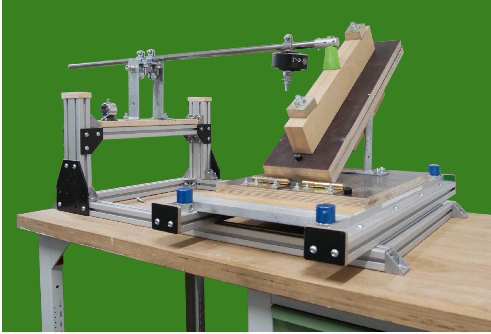 The mechanical rig used in map, mounted on a workbench, with