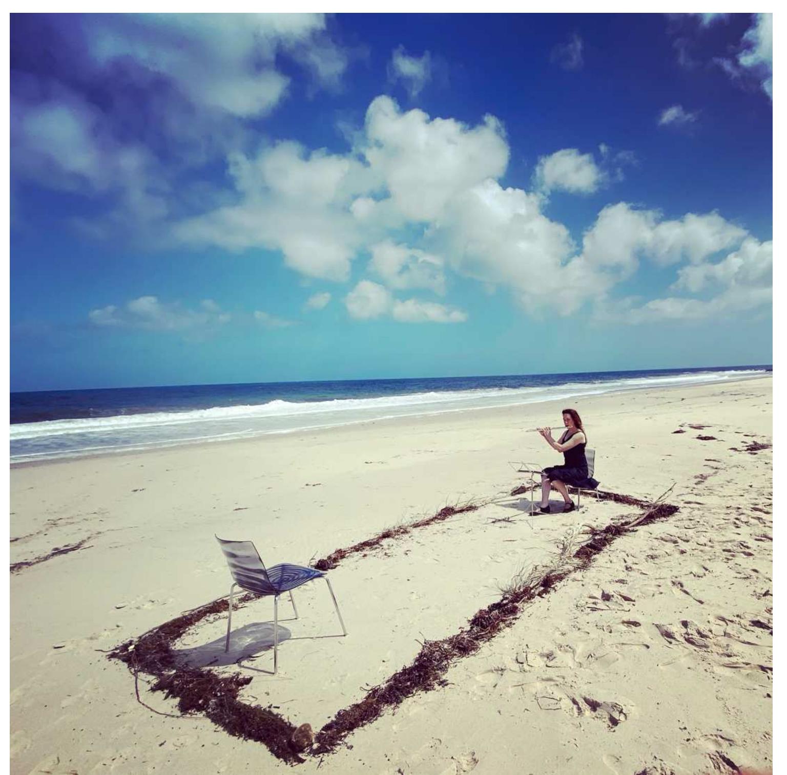 The listener’s account of a 1:1 CONCERT that opened this article refers to many of the key features yf the experience. A Concert involves a musical exchange between a single listener and a single nusician. A third person in the facilitating role of ‘host’ prepares the non-traditional performance enue to careful specifications: a 3.7m x 1.4m rectangle is marked out with material chosen by the lost — preferably something already found in the space (such as seaweed or shells on a beach, or ricks or branches in a garden). The host receives the listener upon their arrival, explains what is to yccur, and takes the listener to the performance space. There, the musician awaits, an experienced and typically, professional) performer. The listener does not know in advance who the musician is, yr the instrument or repertoire. It is only during the minute of silent mutual gaze that the musician lecides what to play or sing for the listener. The whole encounter is non-verbal, and the listener is sked not to applaud (but may show appreciation to the listener in other ways). At around 10 ninutes in duration, in concert terms the whole encounter is brief.  The rapid expansion of 1:1 CONCERTS in 2020 and 2021 is best understood against the backdrop of the coronavirus pandemic and its ramifications for the arts, artists, audiences, and the  