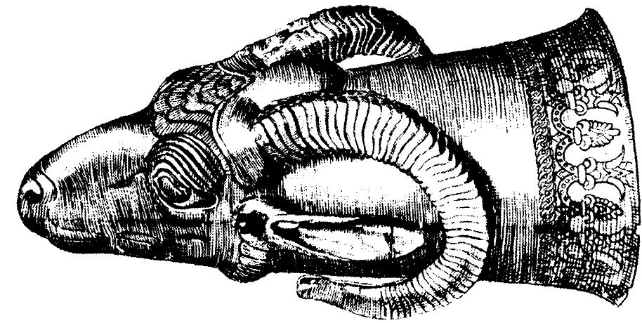 Figure 3: Achaemenid silver ram-head vessel excavated at Ust Kamenogorsk. St Petersburg, Hermitage. Photograph after A. U. Pope A History of Persian Art 1, Oxford, 1938, figure 87.  Herodotos also mentions ‘other drinking vessels’ —- perhaps he had no applicable Greek term for a foreign form. Perhaps he refers to the horizontally fluted beaker also visible on the reliefs, or perhaps he means the animal-head or animal-protome cup, which later on was known as protome in Greek. The animal head cup is more elusive archaeologically as it is not rendered at Persepolis and few examples have good provenances (Figure 3). Their presence in booty has been deduced from some animal protomes on the coinage of Delphi about the Persian War period. 