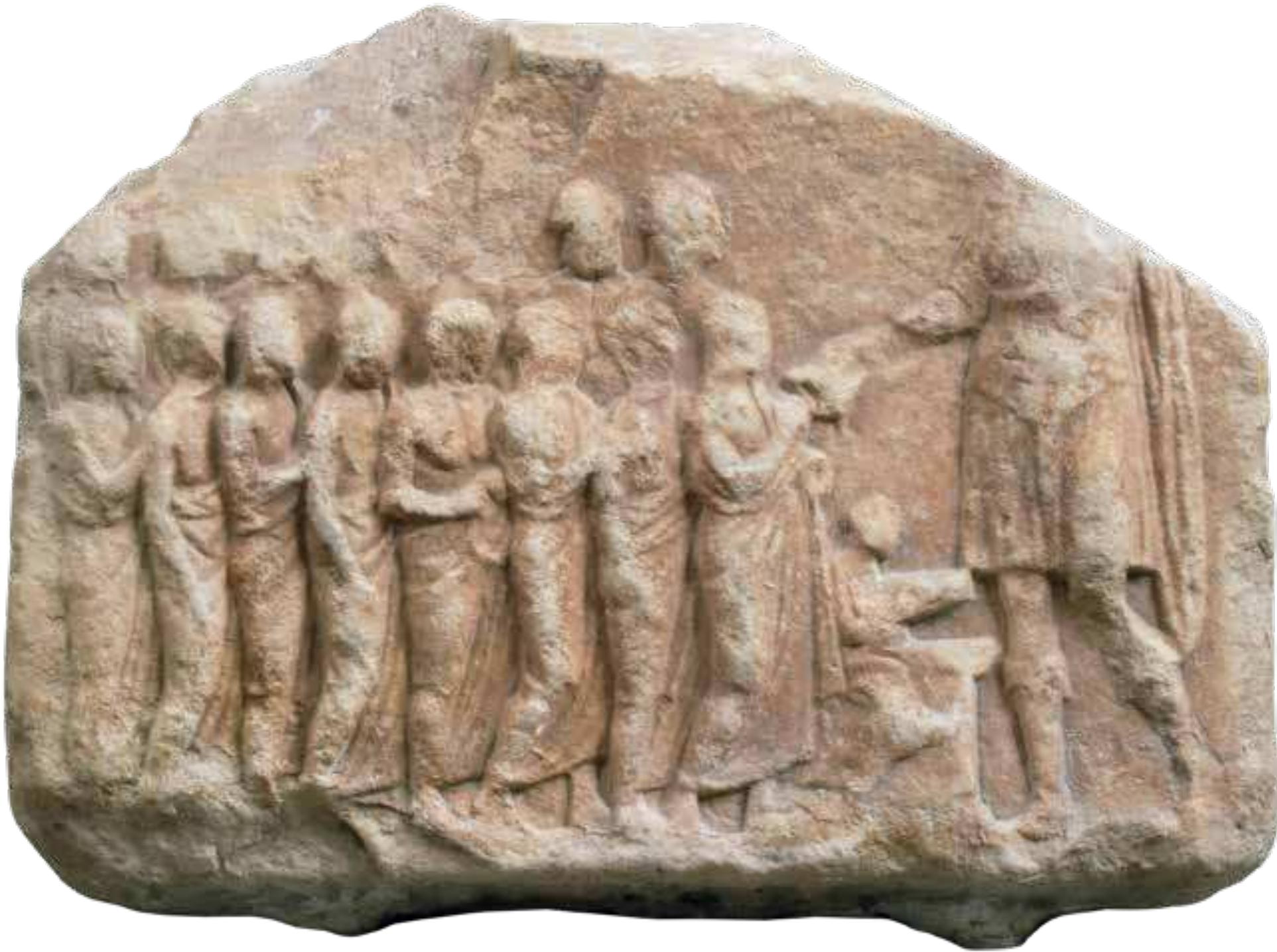 Fig. 8. Marble votive relief, NAM [ 2400. From Koropi. Members of a chorus,  who won in dramatic contests, are depicted approaching Dionysus for the sacrifice  that celebrates victory. Ca. 320 BC.  one of which at least is shown holding a victory wreath, approaching Dionysus for the sacrifice that would celebrate the victory. Evidently, they are identified as chorus members in tragic contests during the Rural Dionysia of the ancient deme of Sphettos, led by the choregos. Seldom is the depiction of the cho- rus members during didaskalia (performance) encountered. Finally, individua representations are also found showing Dionysus reclining as a symposiast, ap- proached by the choregos or a group of people associated with the theatrica performances”, as in the case of the earliest of all reliefs from Piraeus NAM  15007’ portraying three hypokrites (actors) approaching the god and holding their theatrical masks.  