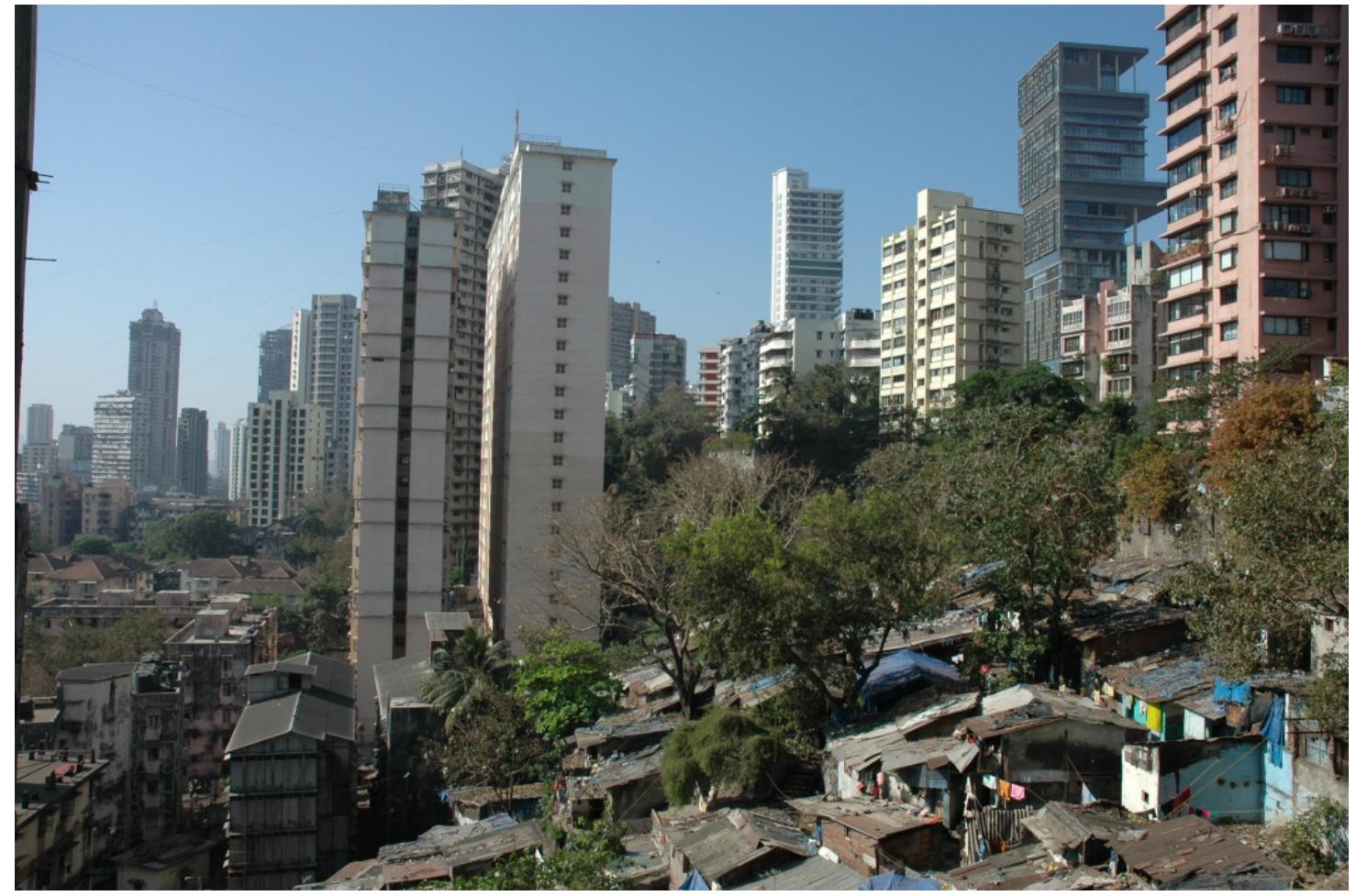Image 8: Highrise and slums juxtaposed in close proximity in Mumbai — an image that defines the contemporary image of the city (photo credit Rahul Mehrotra) 