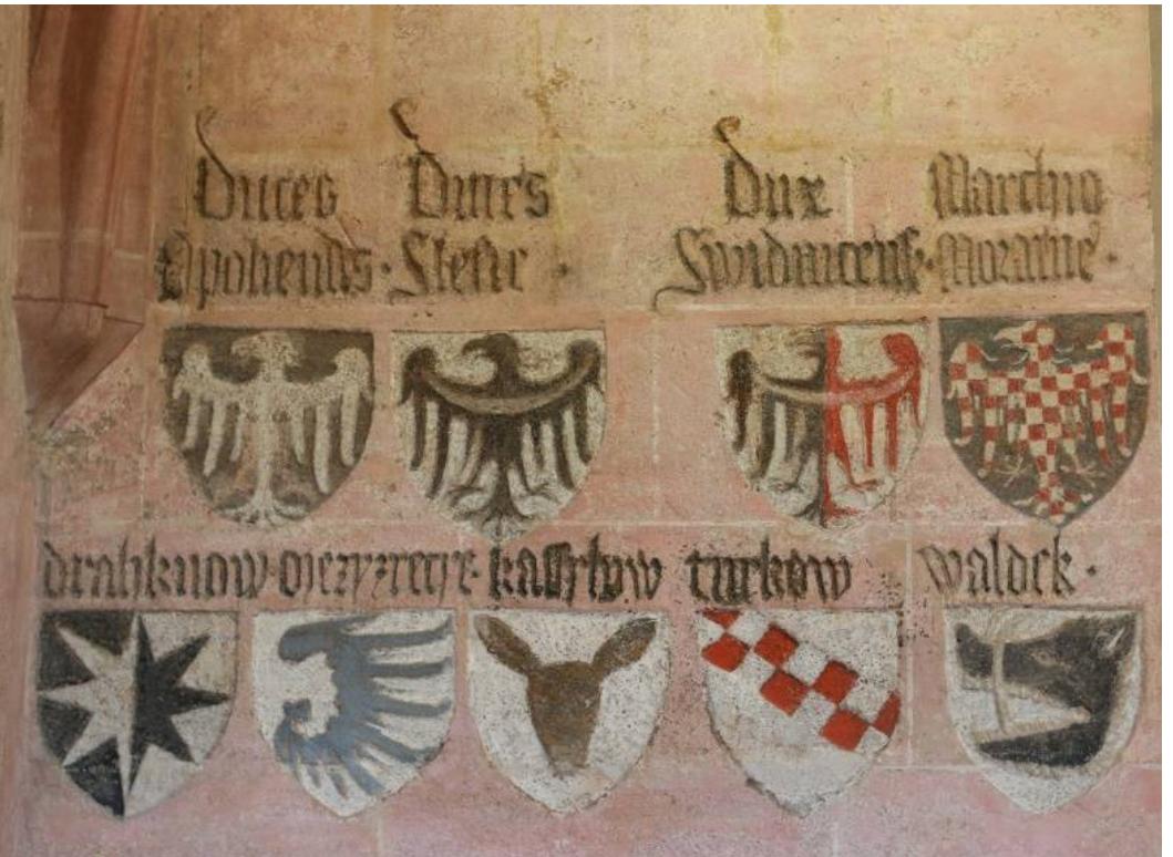 Of the  paintings associated with Charles IV, the oldest are probably the decorative  and heraldic murals discovered at Veveri Castle (Bolina et al. 2002; Zaruba 2021a, p. 105),  unfortunate built while  y preserved only in fragments. These adorned the walls of the castle Charles he was still the Margrave of Moravia (the building was not fully completed  until the reign of John Henry). The former main hall was also decorated with figural representations, of which only an image of the head of Christ dated to the second quarter  or around t was beyond  he middle of the 14th century, has survived to the present day. Charles IV any doubt an outstanding patron of the arts and an extremely broad-minded  man. This was fully reflected in the spectrum of painted decoration associated with him.  Castle, and  he original  Prague Cast  The most outstanding were the paintings at Prague Castle (Old Royal Palace), Karl8tejn  also at VySehrad Castle. Worth mentioning, too, is the heraldic decoration  partially preserved to this day in one of the rooms of Lauf an der Pegnitz Castle (RUZek 988, 2006) (Figure 2). Undoubtedly, special attention should be paid to Prague’s Old Royal Palace, which was thoroughly reconstructed, an ambitious project initiated by Charles V in 1333, and completed sometime between 1340 and 1345. Unfortunately, the palace was substantially rebuilt in the late Gothic style in the following century, so in discussing  appearance of the painted decoration all we have to rely upon are a few  fragments discovered by Karel Fiala in the 1920s and very scarce written sources. The murals uncovered in the window recesses of the Great Hall were later transferred to the  le collection and thus preserved to this day. Unfortunately, they have not been  publicly exhibited since 1946.  Figure 2. Lauf an der Pegnitz castle (Wenzelsburg), Vladislav Hall. Hall of arms. 1356-1360. Photo by FrantiSek Zaruba, the author’s own work. 