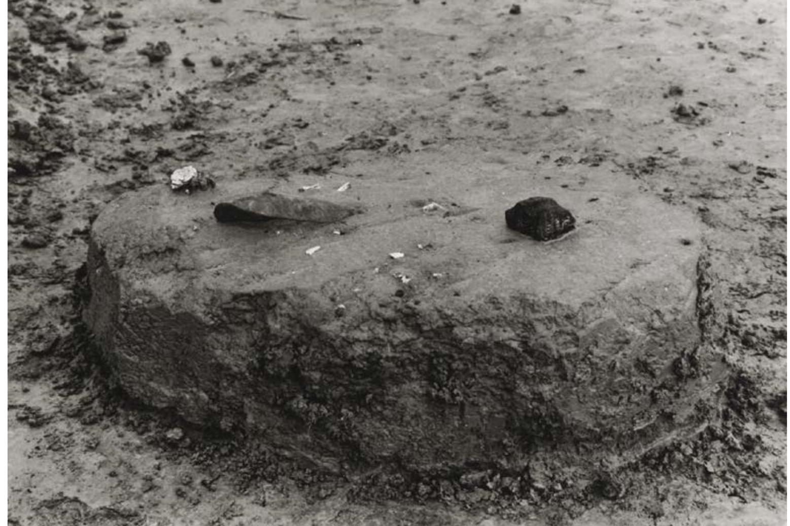 Fig. 6.5 A cremation grave ‘island’ (grave 66) during excavation. The small, calcined bone fragments are still visible.  As the cremation graves were already visible at a higher level, these stood out on the excavation surface like little ‘islands’ (Fig. 6.5). The graves were excavated by hand (Fig. 6.6) and field drawings and photographs were made at various depths. When documenting the Braves a division was made between finds recovered when removing topsoil, finds in the ill of the grave or finds present in the bottom of the grave pit (above or below the presumed  Most cremation graves are found in the western part of the burial ground despite the fact that a mechanical excavator was used,?* instead of the eastern part which was excavated 