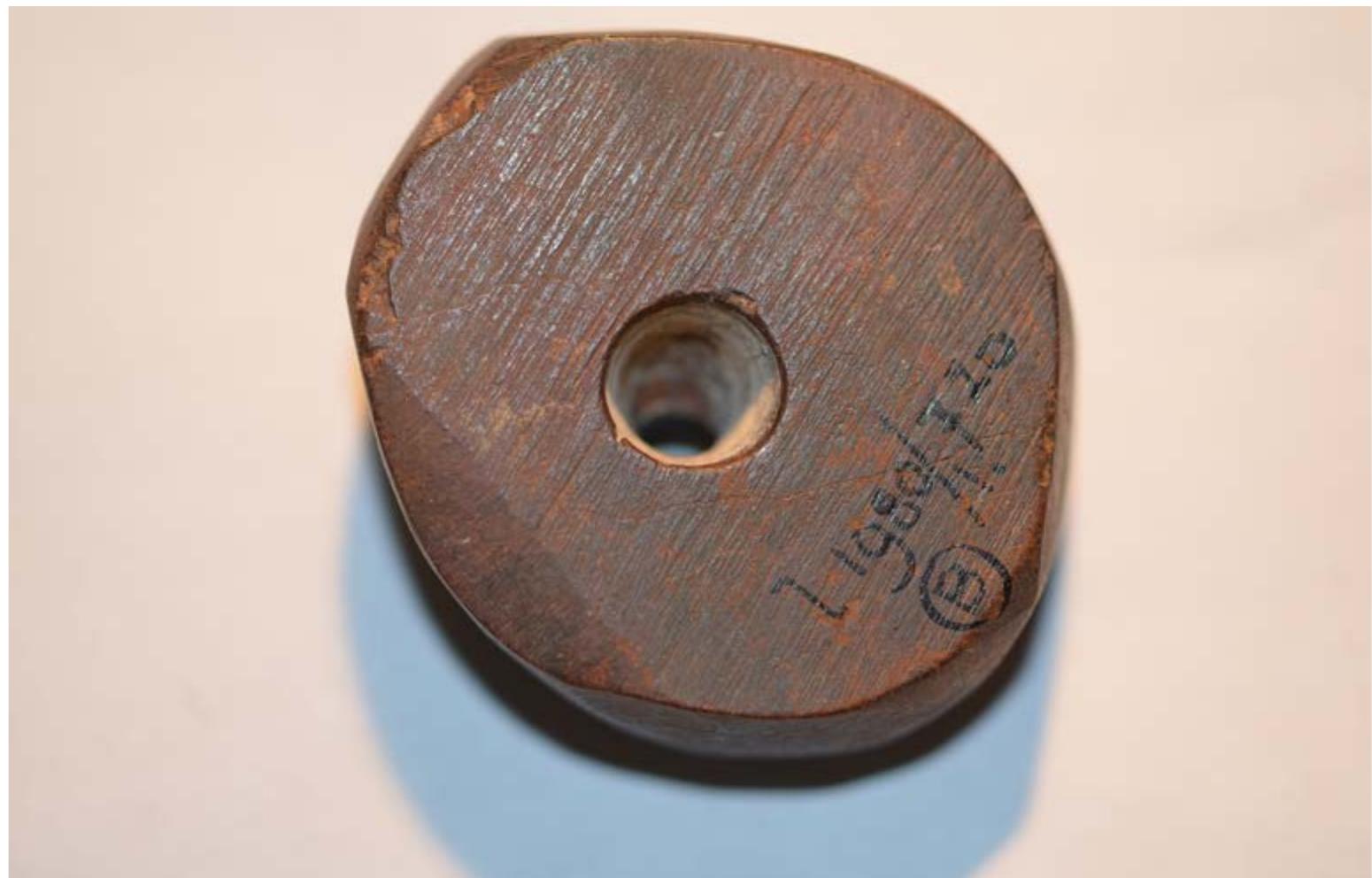 Fig. 9.6 Perforated ornament of hematite (nr. 720). 