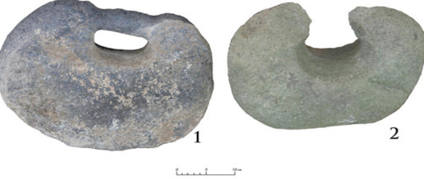 Fig. 7. Stone No. 2 with Pale Green Color is Observed Beside the Stone No. 1 With Black Color  Fig. 6. Some Pores of the Bottom of the Stone No. 1 Can Be Observed in This Figure. 
