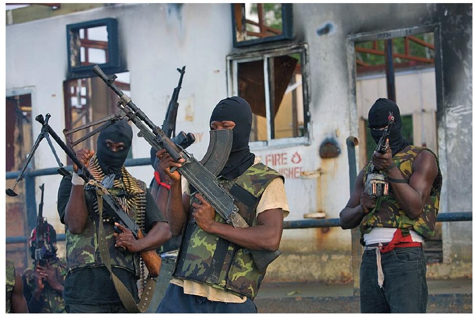 Photo 1: Militants of the Movement for the Emancipation of the Niger Delta (MEND). Photo: Ep Kasur  of trade and the first crashing waves of IMF auster- ity — then how might one characterize the last fifteen years (a long decade in which the benefits of reform were to be finally felt) in which life expectancy across subs Saharan Africa has steadily fallen and per capita income has at best stagnated? A ‘Lost Genera- tion’? And all of this during a period in which net of- ficial ODA fell by 40% (from $18.7 to $10 billion). If it is lucky, Africa will achieve its Millennium Goals of universal primary education and a 50% reduction  