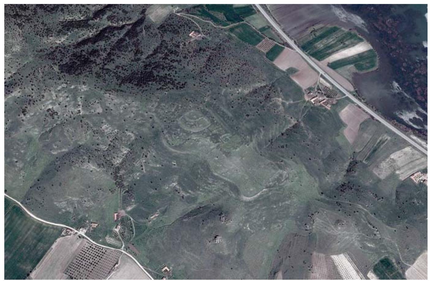 FIGURE 20: Aerial photo from 2014, before excavations began, showing the massive walls of the Late Bronze Age citadel of Kaymakgi, enclosing over 2,000 m2 (Google, Digital Globe and Google, CNES/Astrium). 