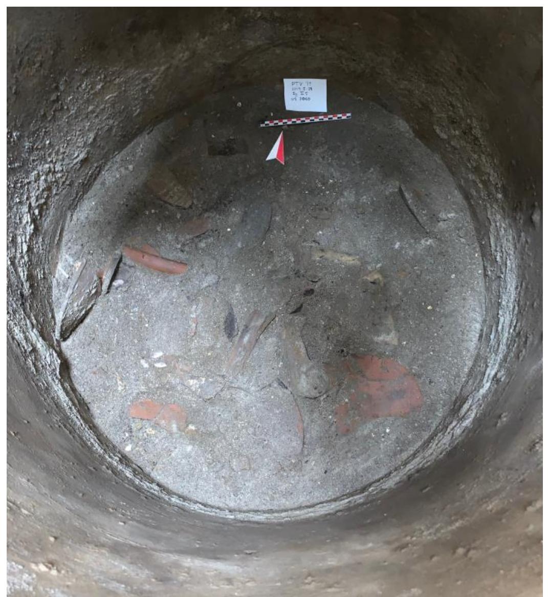 Fig. 13. VPP 2019, Trench IIS-W: View of the concentration of ceramic vessels (3060) deposited at the bottom of the Room B cistern in Phase 1b (Photo: VPP).  M. Mogetta — I. Battiloro — I. Varriale — D. P. Diffendale — G. Iacomelli - M. D’Acri — C. Corbino — C. Comegna — G. Pardini e Archaeolc Research at the Sanctuary of Venus in Pompeii: Interim Report of the 2018-2019 Seasons of the Venus Pompeiana Project 