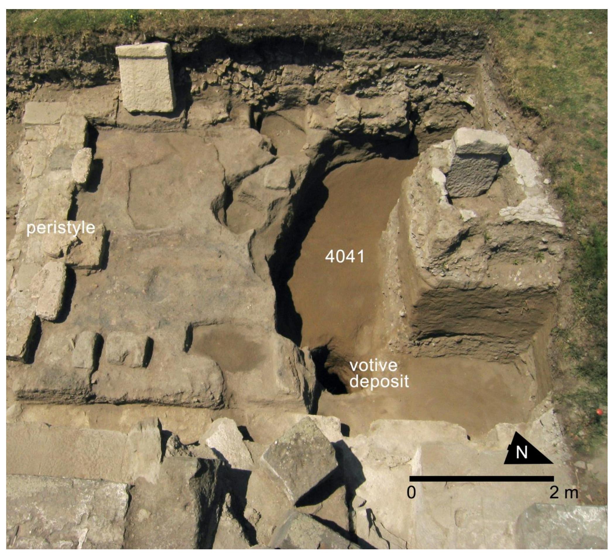 Fig. 21. Detail of the large cavity (4041) identified in 2005 W of the temple podium (Photo: M. Mogetta). Note the position of Phase 1a fea- tures (peristyle and votive pit).  M. Mogetta — I. Battiloro — I. Varriale — D. P. Diffendale — G. Iacomelli - M. D’Acri — C. Corbino — C. Comegna — G. Pardini e Archaeolc Research at the Sanctuary of Venus in Pompeii: Interim Report of the 2018-2019 Seasons of the Venus Pompeiana Project 