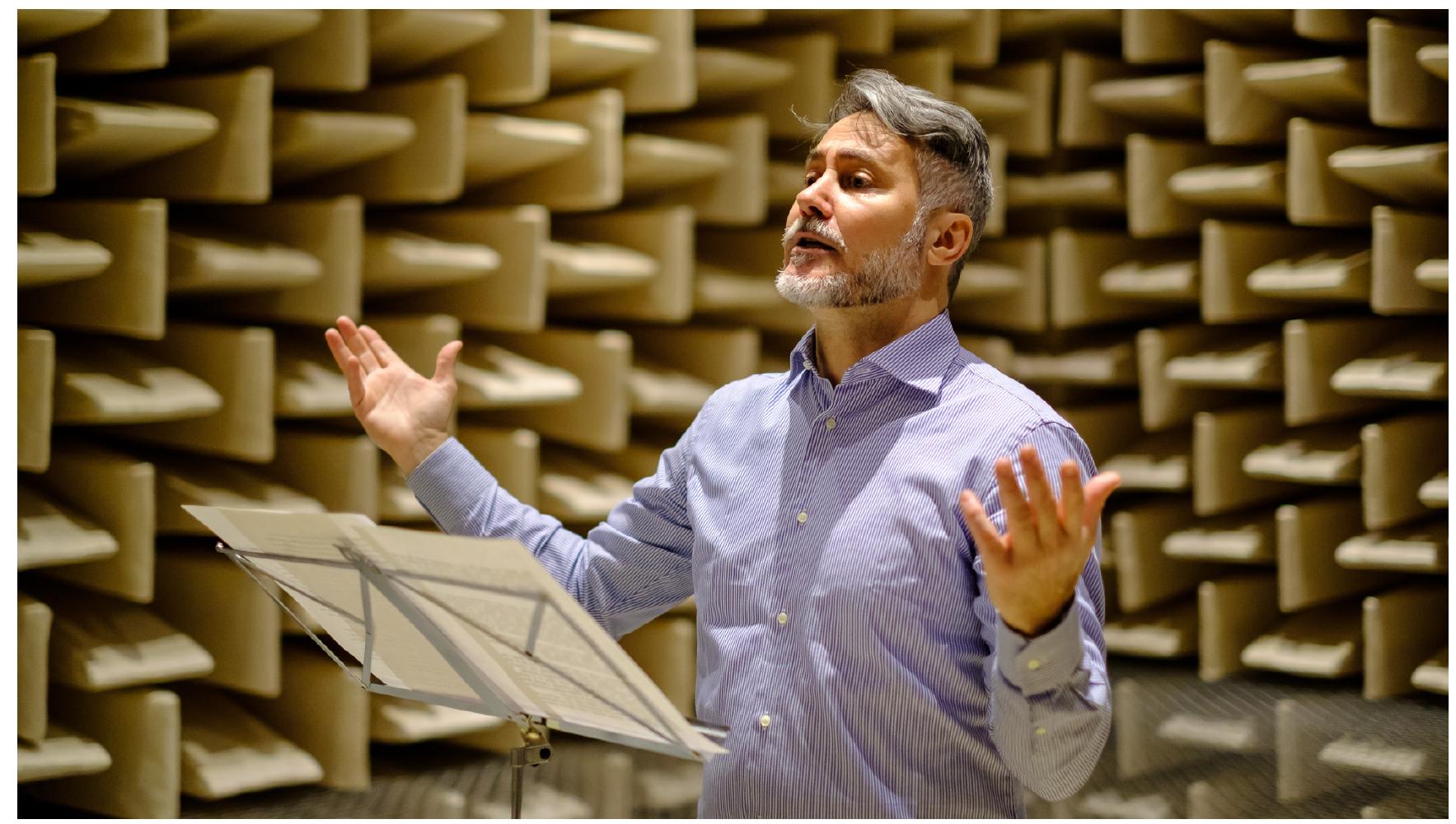 Figure 1: Speaker Adriano Evangelisti during the recording session in the anechoic cham- ber of the TU Berlin.  General Information 