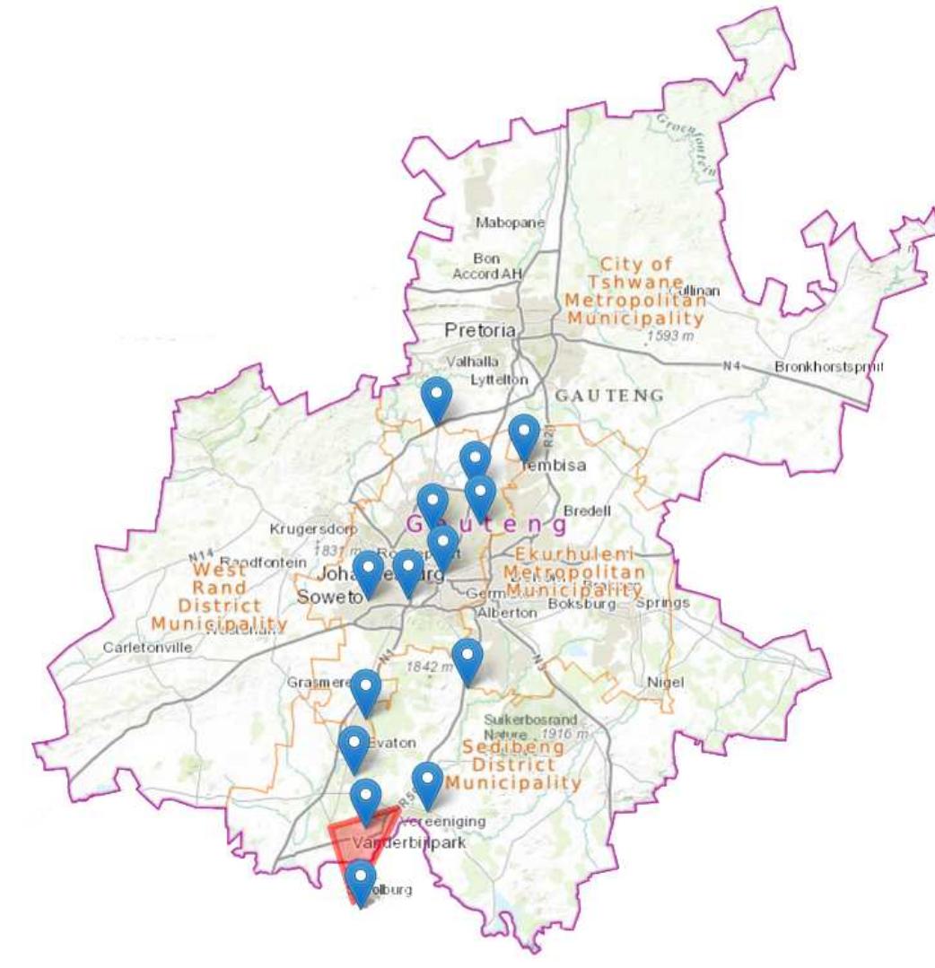 Fig. 1. Municipalities within the Gauteng Province and locations of monitoring stations in Johannesburg with blue markers and the Vaal triangle area highlighted in red. 