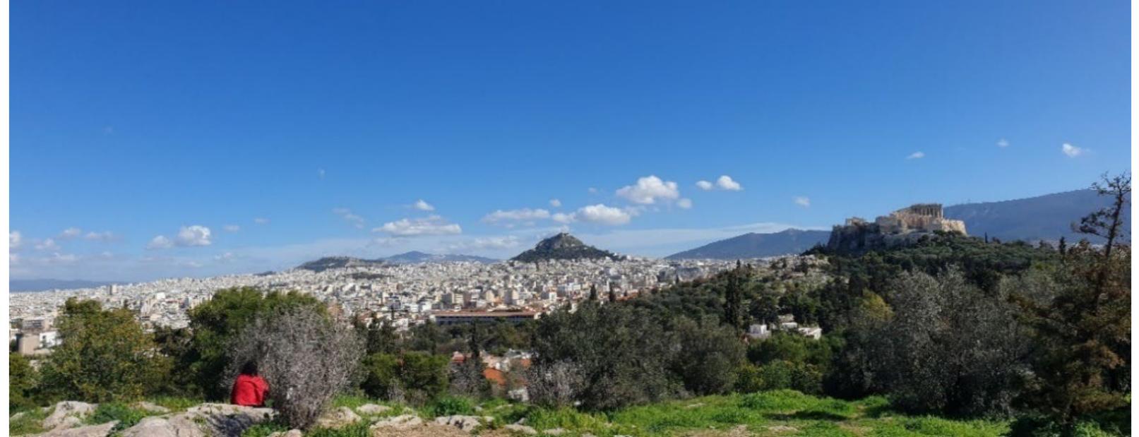 Figure 4. Park “Philopappou Hill” (Source: Giannis Sotiriou’s personal archive).  of the hills and the archaeological finds and the excavations by archaeologists, suggest the >xistence of ancient habitation in the area. The Park is located in the center of the districts of Makrigianni, Koukaki, Petralona and Thiseio and is a unified archaeological site covering a total area of 70 hectares (173 acres) [36]. On the southern side of the park there is also the Dora Stratou Theatre. 