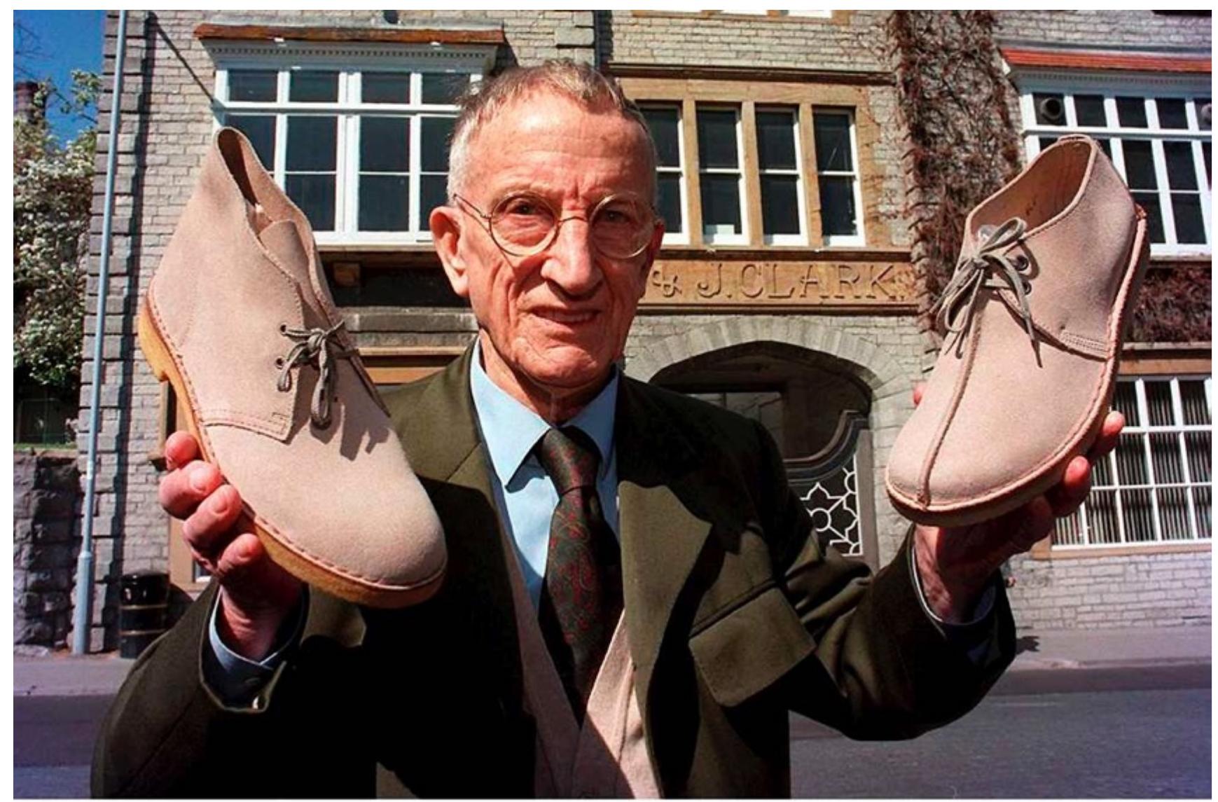 ig.3.11: Nathan Clark with the Desert Boot and the Desert Trek outside Clarks head office. Image courtesy of Clarks. 