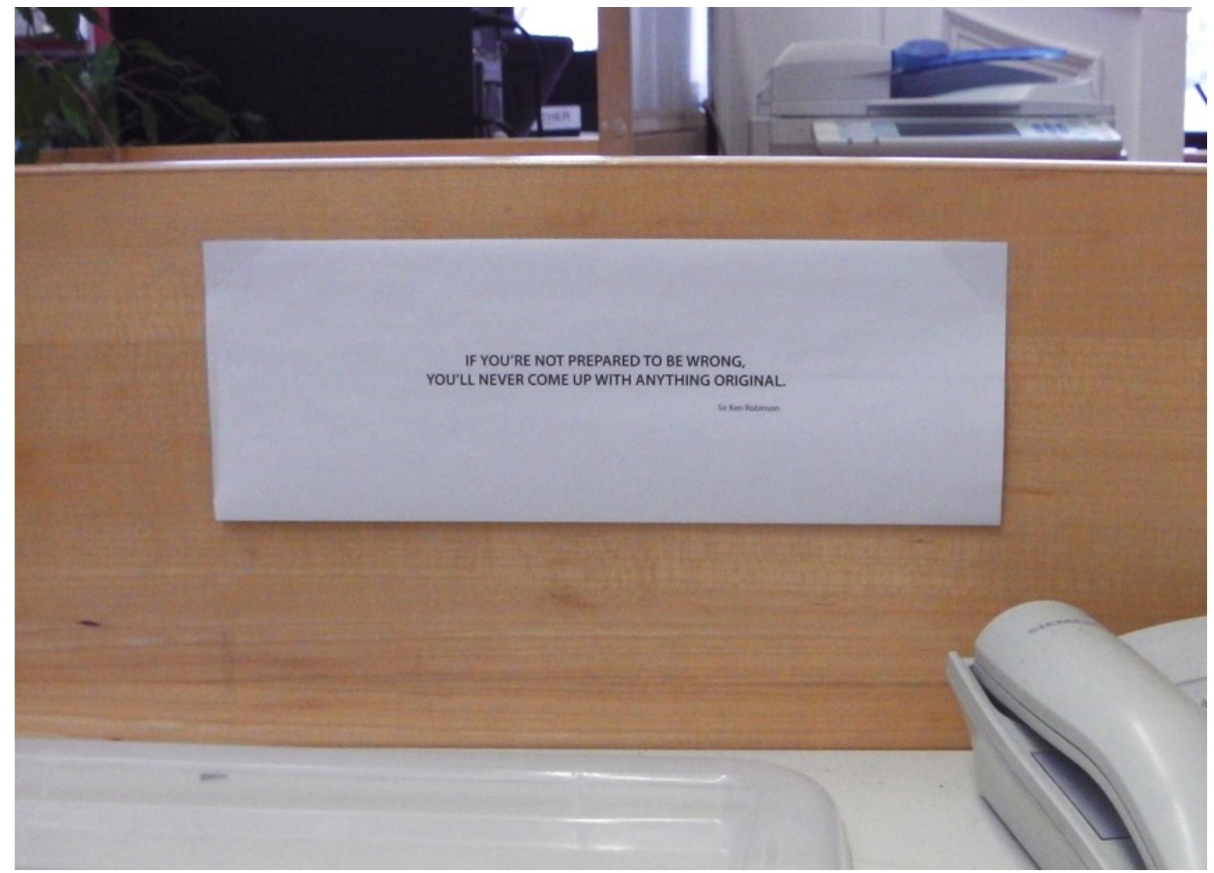 Fig.6.12: Quote by Sir Ken Robinson, stuck to the partition of a desk in one of the open plan offices. 