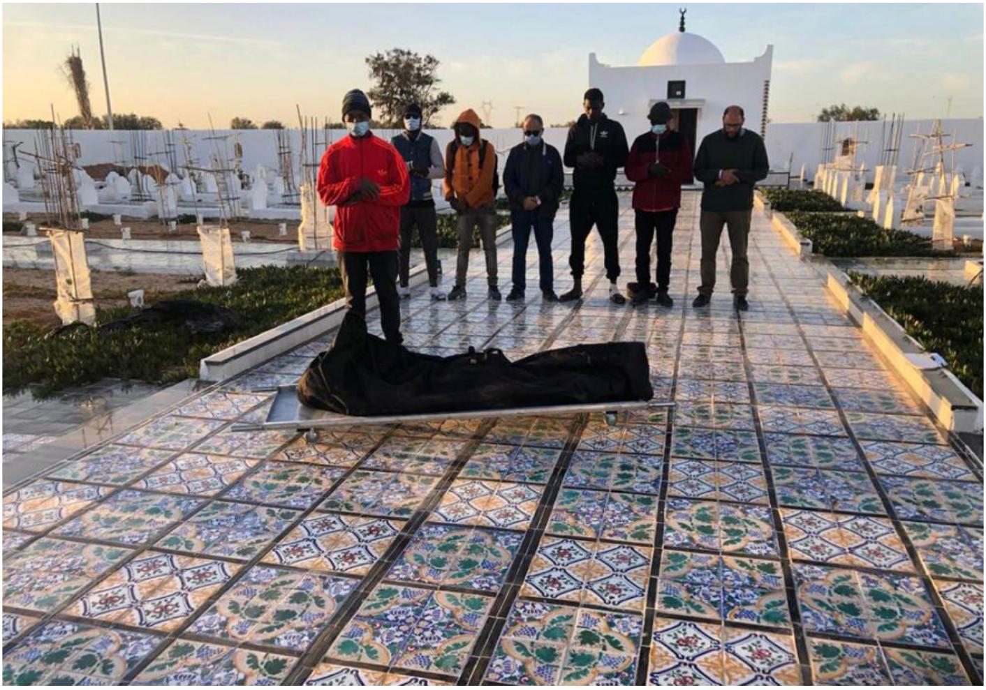 Fig, 8. Residents of the nearby refugee shelter offering funeral prayers at Le Jardin d’Afrique, Zarzis, Tunisia. Photograph © Rachid Koraichi. 
