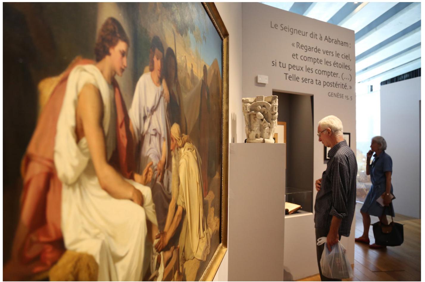 Fig. 32. Section on Abraham at the Mucem. On the left, detail of Abraham lavant les pieds aux trois anges, by Emile Levy, huile sur toile, 1854, Ecole nationale supérieure des Beaux-Arts, Paris.  Aby Warburg, Der Bélderatlas MNEMOSYNE (Berlin: Akademie Verlag GmbH, 2003). 