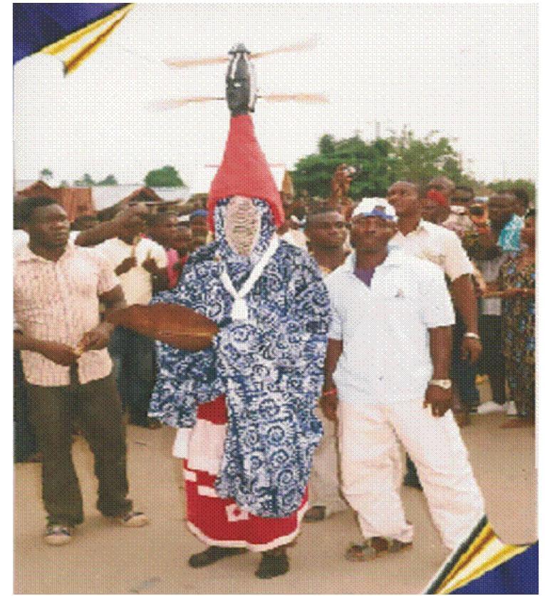 Fig. 3. Ojei Masquerade in Performance (Field Work of Authors, 2020-2022)  Ojei masquerade costume is characterized by different colours, fabrics, accessories and masks. 