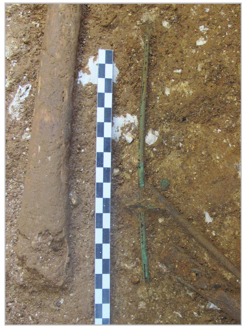 Fig. 19- A copper alloy spindle and whorl found in the same tomb (grave No. 4: context No. 83).  Fig. 18- An assemblage of different artefacts that were possibly maintained on a string (grave No. 4: context No. 83). 