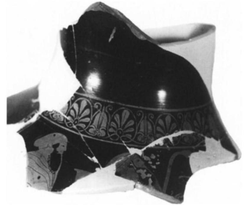 Fig. 15. Attic red-figure amphora fragments, Leningrad Painter, ca. 470-460. Side A: two komasts wearing sakkoi. Adria (Ro), Museo Archeologico Nazionale B.248. (Cour- tesy Museum) 
