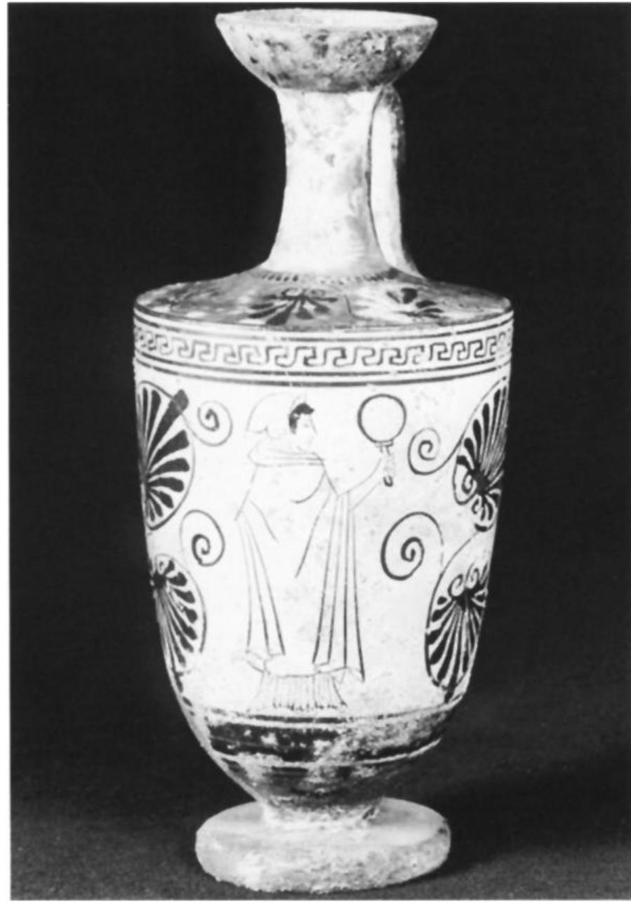 Fig. 18. Attic white-ground lekythos, Painter of Petit Palais 336, 500-480. Woman with mirror. Paris, Musée du Petit Palais 335. (Photo Bulloz) 