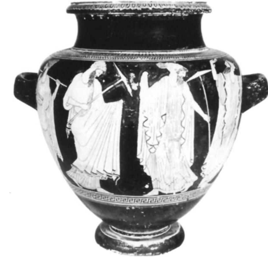 Fig. 21. Attic red-figure stamnos, unattributed, 500-480. Side B: komasts with parasols, some with hair pulled through their mitrai. Madrid, Museo Arqueoldogico Nacio- nal 11009. (Photo A. Trigo, Archivo Fotografico)  the view that the youths, like the youthful komasts and Dionysiac subjects, appear in significant combi- nations with the cross-dressed komasts. 