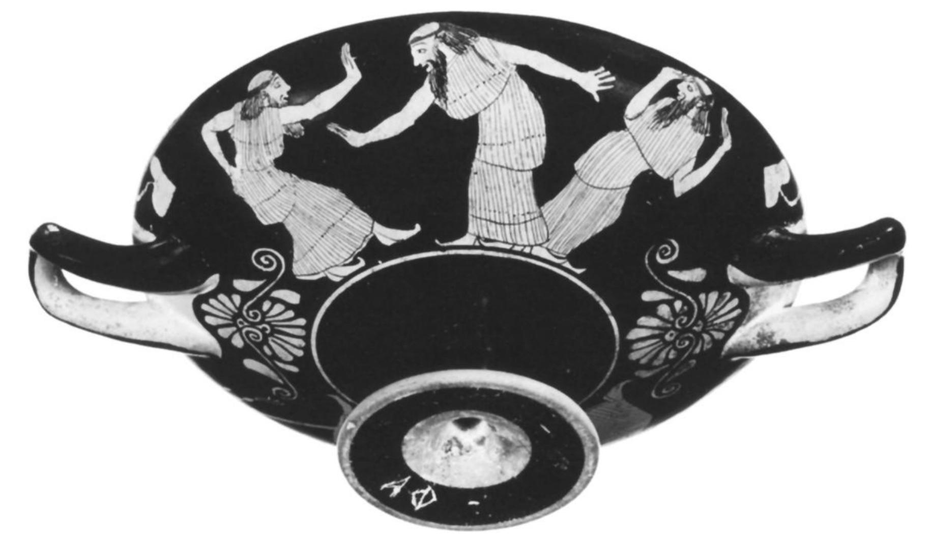 Fig. 26. Attic red-figure cup, Sabouroff Painter, ca. 460. Side A: men dressed in chitons (ritual ithyphalloi?). Mal- ibu, J. Paul Getty Museum 86.AE.296. (Courtesy Museum) 