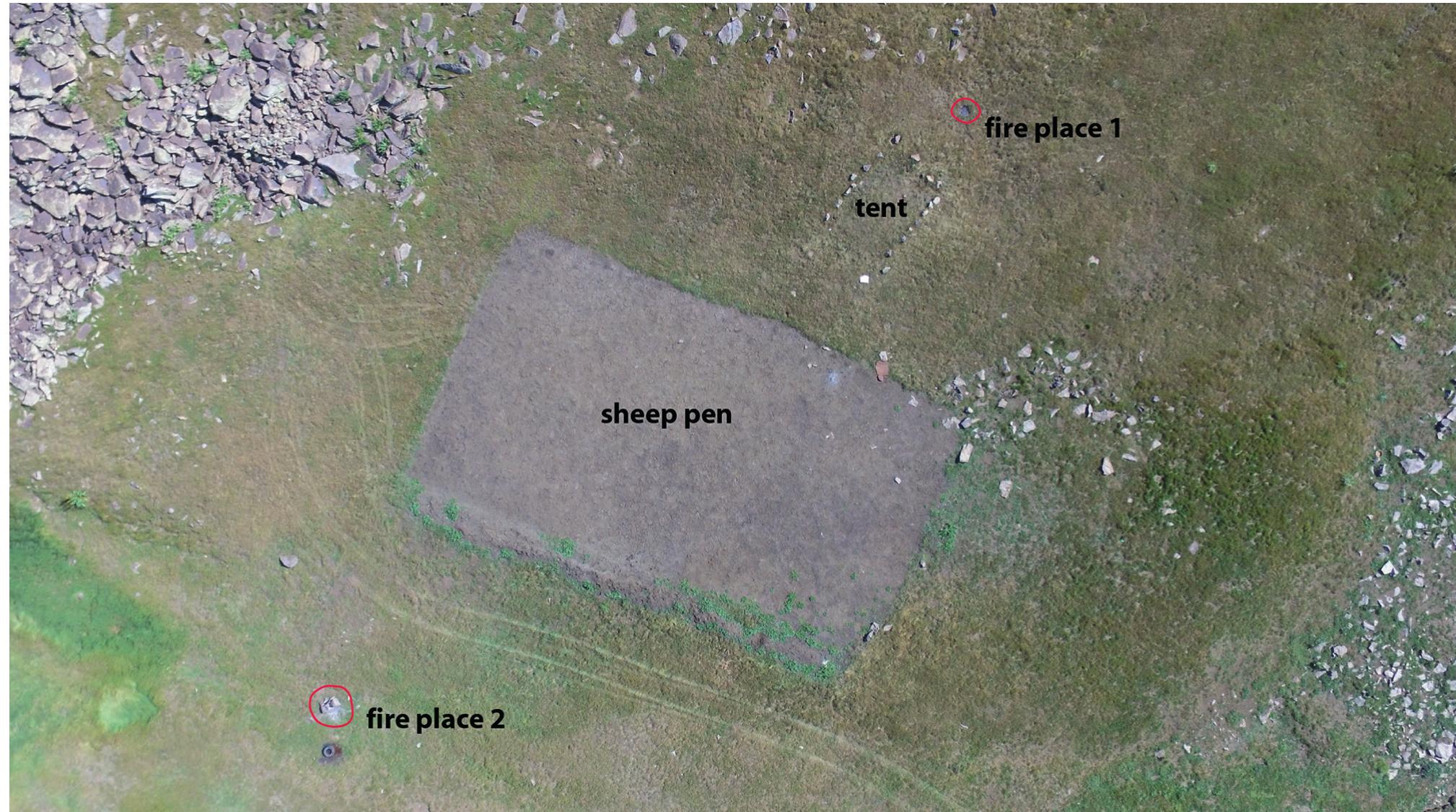 11 — vertical aerial photograph of a campsite, installed in